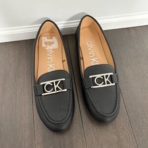 Brand New Women’s Calvin Klein Loafers Black Size 8.5 leather Silver logo